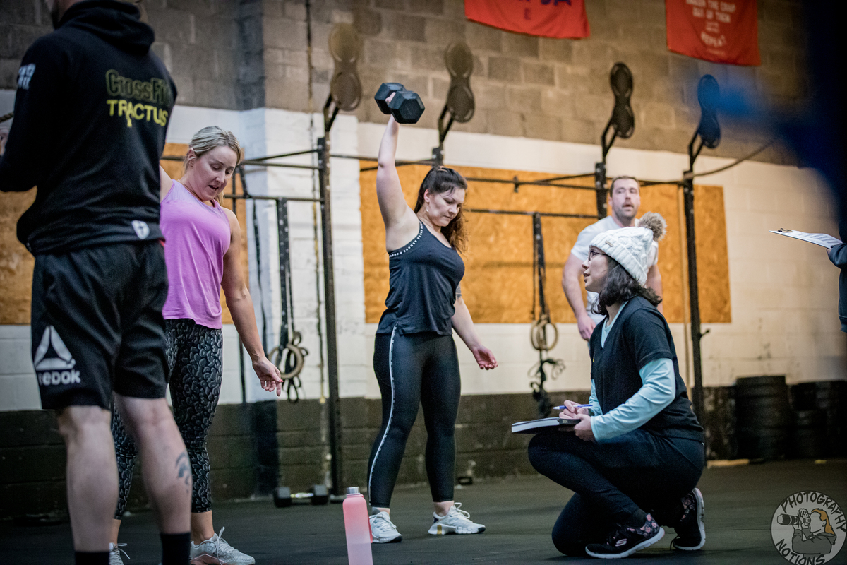 CrossFit coaches working out in the gym